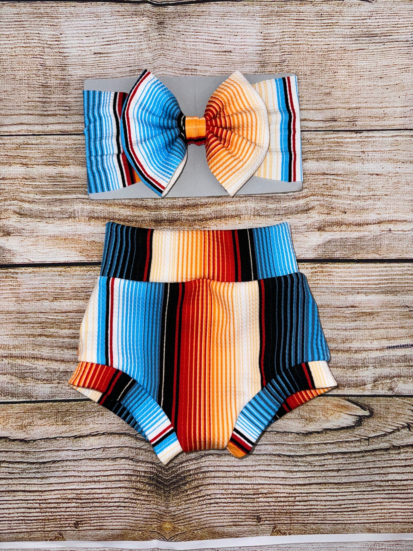 Serape Blue/ Orange Stripes Baby Girl Outfit/ One Shoulder Crop Top/ Bummie and Headwrap or Bow On Nylon